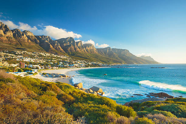 Beach and Twelve Apostles mountain in Camps Bay near Cape Town in South Africa.