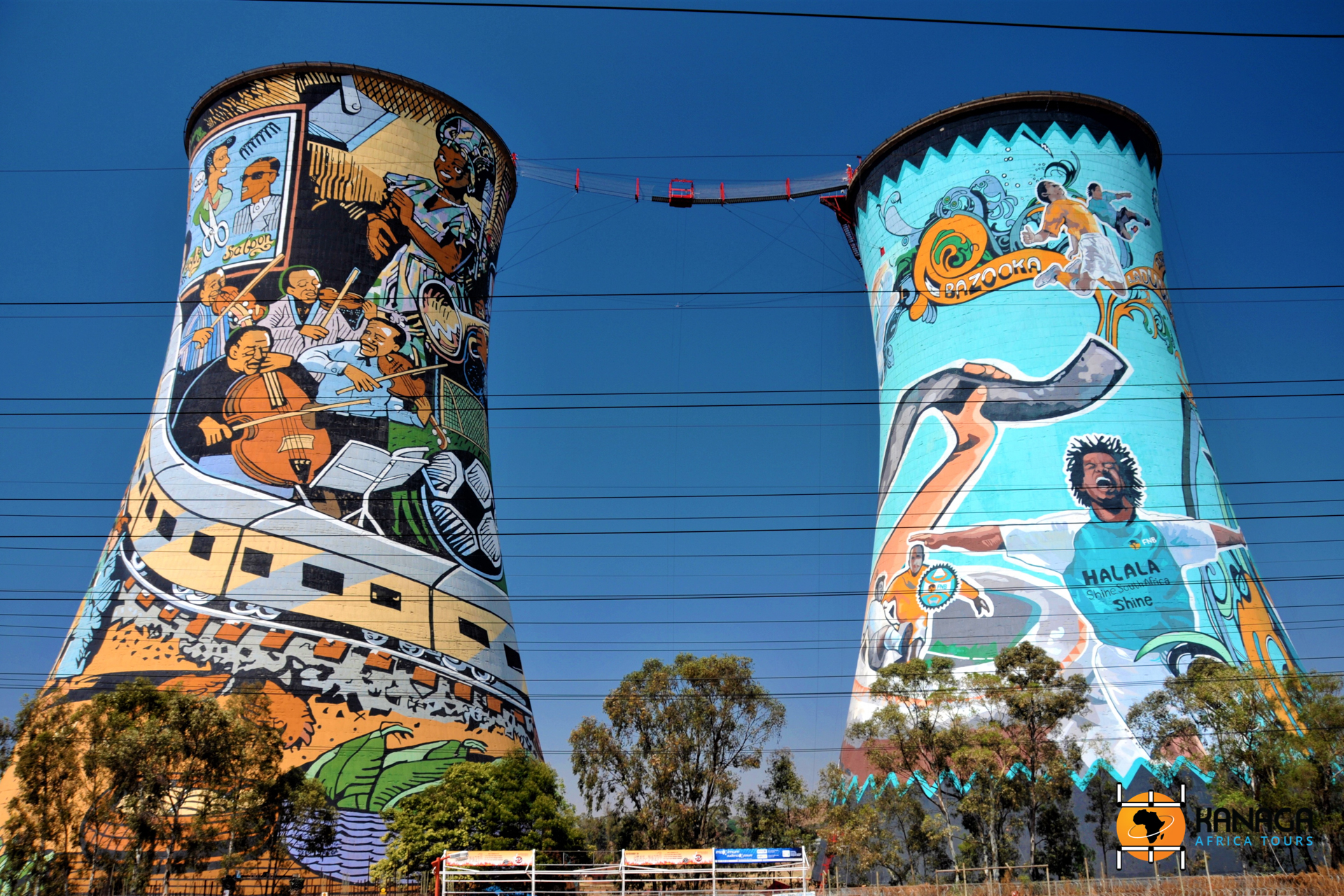 SOWETO, SOUTH AFRICA - SEPTEMBER 26 : Painted chimney pair at 26, September, 2014 at Soweto, South Africa. The painted chimney is the world famous landmark of Soweto, the slum of Johannesburg.