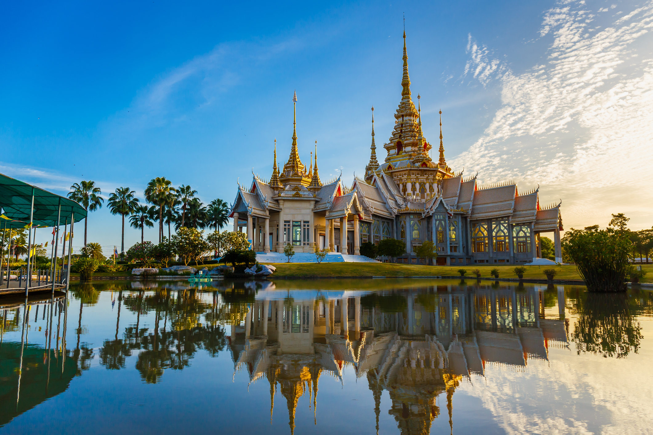 Wat Non Kum or Wat Luang Pho To in Sikhio District, Nakhon Ratchasima, Korat, Thailand is a symbolic place of temples in Thailand. At sunset, there is a reflection in the water.