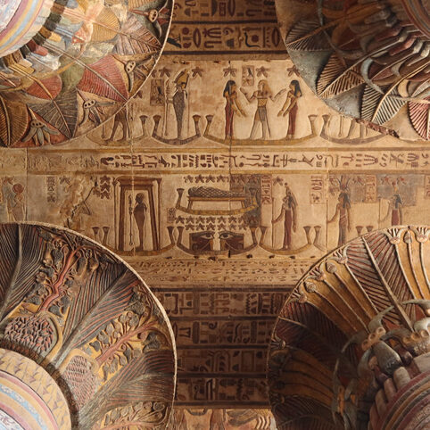 Beautiful colorful inscriptions on the walls and ceiling of Khunum temple in Esna in Luxor